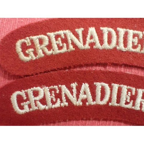 14 - WW2 British Grenadier Guards titles

Near-matching pair, 134 mm across.
