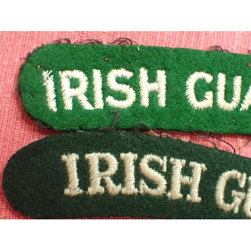 15 - WW2 British Irish Guards titles

Not an exact pair; one is 111 mm across, the other, 100 mm.