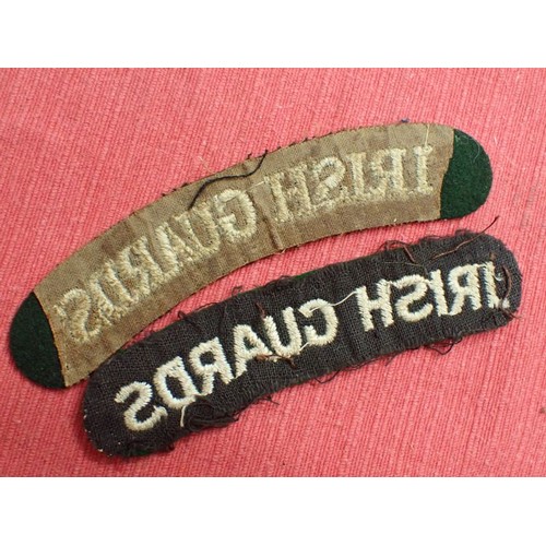 15 - WW2 British Irish Guards titles

Not an exact pair; one is 111 mm across, the other, 100 mm.