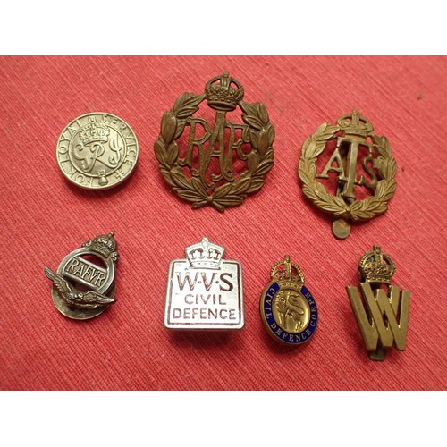 17 - Seven WW2 British metal badges

All with their fixings intact to the backs.