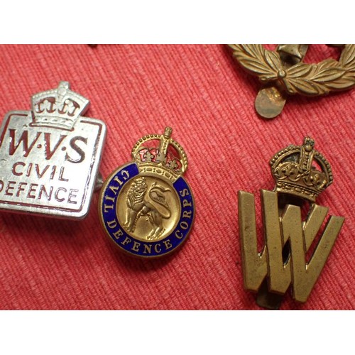 17 - Seven WW2 British metal badges

All with their fixings intact to the backs.