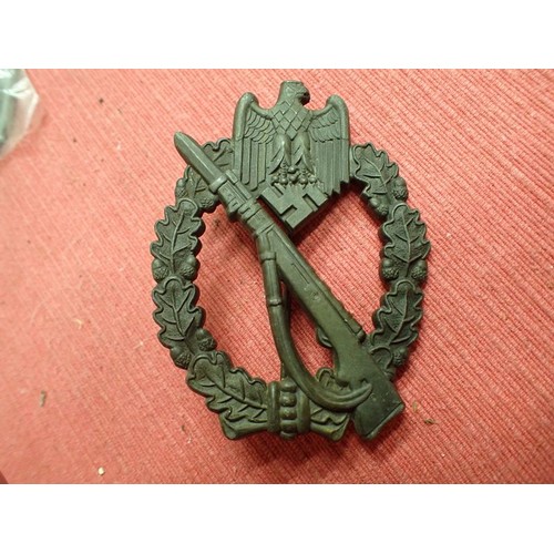 20 - WW2 German Infantry Assault badge

Good clean, untouched condition. Maker mark for W.H. to the back.