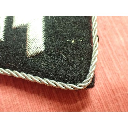 31 - WW2 German Waffen-SS officers' collar tab

One of the under-folds is loose, as is some of the wirewo... 