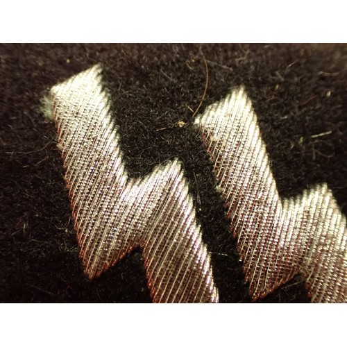 31 - WW2 German Waffen-SS officers' collar tab

One of the under-folds is loose, as is some of the wirewo... 