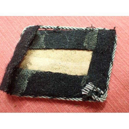 31 - WW2 German Waffen-SS officers' collar tab

One of the under-folds is loose, as is some of the wirewo... 