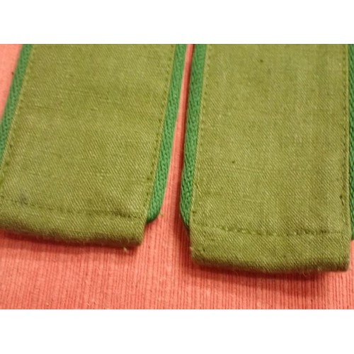 36 - WW2 German army mountain troop shoulder straps

Green linen straps with tan backing to the fasteners... 