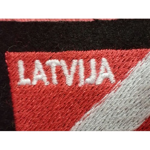 40 - WW2 German Waffen-SS Latvian volunteer div patch

Stitched shield on black woollen backing. Very goo... 