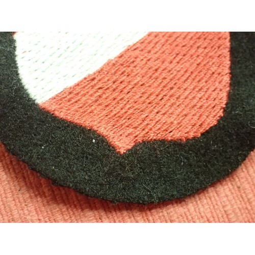 40 - WW2 German Waffen-SS Latvian volunteer div patch

Stitched shield on black woollen backing. Very goo... 