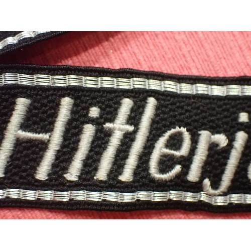 41 - WW2 German Waffen-SS Hitlerjugend cuff title

Traces of its paper RZM label to the back. 450 mm long... 