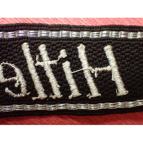 41 - WW2 German Waffen-SS Hitlerjugend cuff title

Traces of its paper RZM label to the back. 450 mm long... 