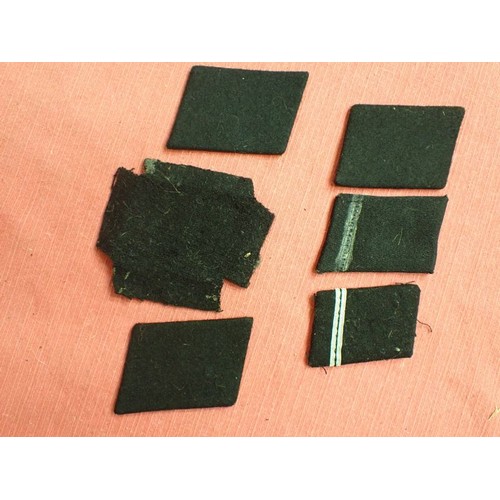 42 - Six WW2 German SS plain side collar tabs.

Three very similar, around 76 mm across. One with a rank ... 