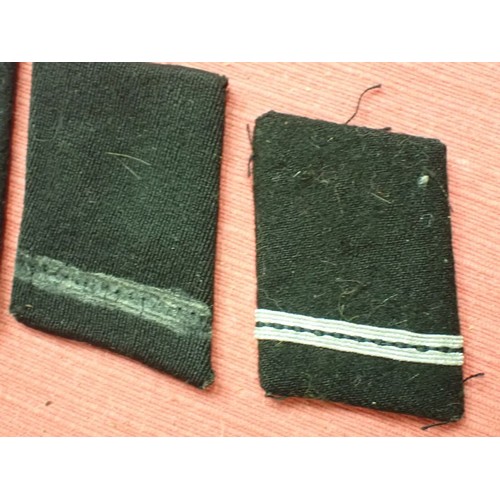 42 - Six WW2 German SS plain side collar tabs.

Three very similar, around 76 mm across. One with a rank ... 