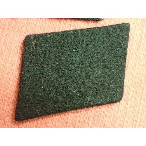42 - Six WW2 German SS plain side collar tabs.

Three very similar, around 76 mm across. One with a rank ... 