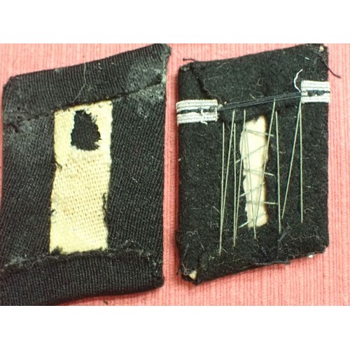 42 - Six WW2 German SS plain side collar tabs.

Three very similar, around 76 mm across. One with a rank ... 