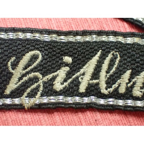 43 - WW2 German Waffen-SS Adolf Hitler division cuff title

Nice-looking, worn cuff title. Stitched scrip... 