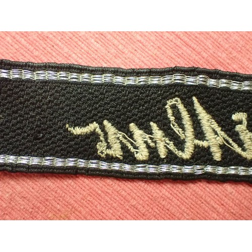 43 - WW2 German Waffen-SS Adolf Hitler division cuff title

Nice-looking, worn cuff title. Stitched scrip... 