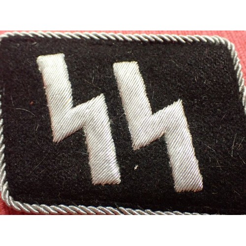 44 - WW2 German Waffen-SS officers' runic collar tab

Tab in very good condition, only minimal wear to th... 