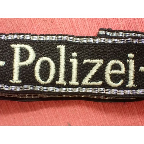 45 - 3rd Reich German SS-Polizei-Division cuff title

Slight wear and some creases; otherwise, in good or... 