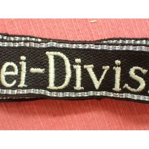45 - 3rd Reich German SS-Polizei-Division cuff title

Slight wear and some creases; otherwise, in good or... 