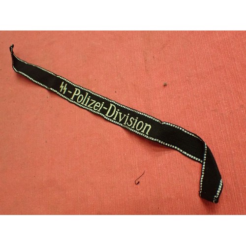 45 - 3rd Reich German SS-Polizei-Division cuff title

Slight wear and some creases; otherwise, in good or... 