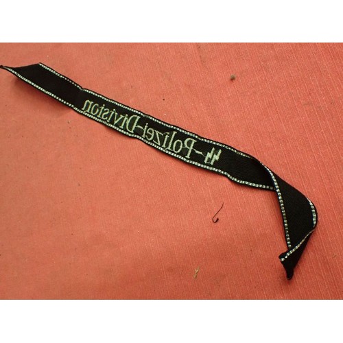 45 - 3rd Reich German SS-Polizei-Division cuff title

Slight wear and some creases; otherwise, in good or... 
