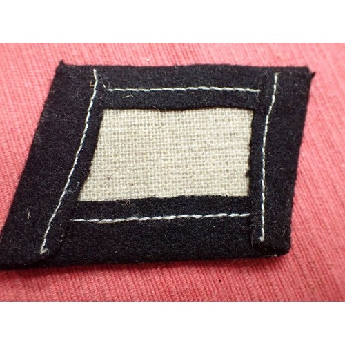 46 - WW2 Waffen-SS British volunteer collar tab

Dachau produced tab. As found in the stores when the cam... 