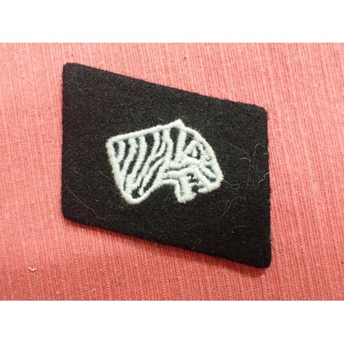 47 - WW2 Waffen-SS Indian volunteer collar tab

Dachau made tab, as found when the place was cleared out ... 