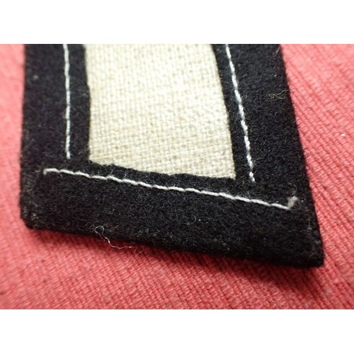 47 - WW2 Waffen-SS Indian volunteer collar tab

Dachau made tab, as found when the place was cleared out ... 
