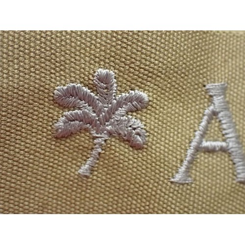 48 - WW2 German army AFRIKA cuff title

Thick grey/blue stitched script. The band is 435 mm long. Very go... 