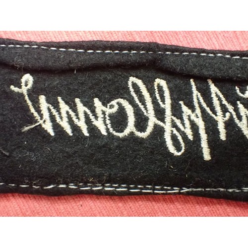 49 - WW2 German army Grossdeutschland cuff title

Stitched white script on a black woollen band. White bo... 