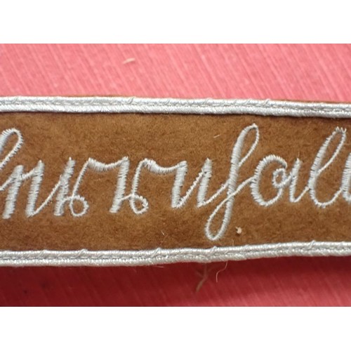 50 - 3rd Reich SA Feldherrnhallen cuff title

Grey stitched script on a brown woollen band. Aluminium wir... 