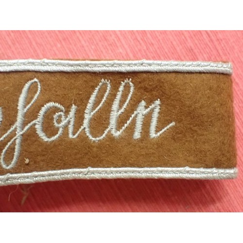 50 - 3rd Reich SA Feldherrnhallen cuff title

Grey stitched script on a brown woollen band. Aluminium wir... 