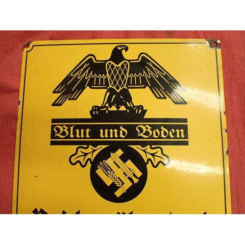 53 - 3rd Reich German blood and soil wall sign

Enamel on steel wall sign, 400 by 300 mm. Maker marked to... 