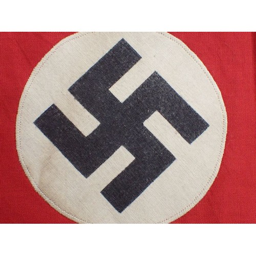 58 - 3rd Reich German NSDAP party armband

Red band with separate roundel and printed swastika. In good, ... 