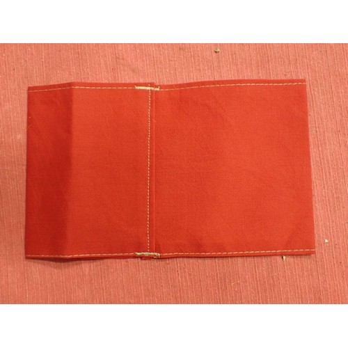 58 - 3rd Reich German NSDAP party armband

Red band with separate roundel and printed swastika. In good, ... 