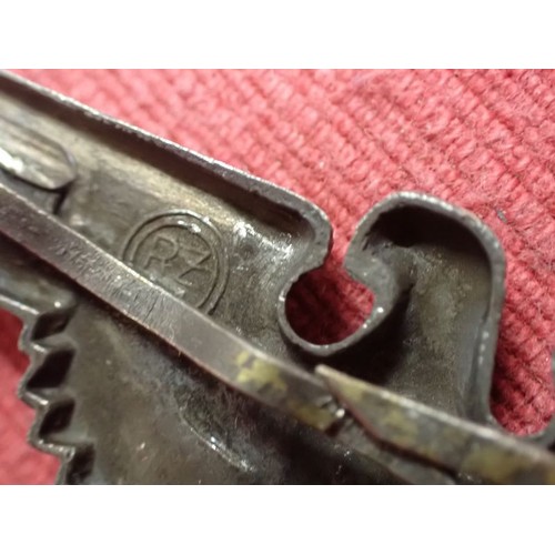 61 - WW2 German SS visor cap eagle

Turned to a dark grey patina. Both fixing pins remain to the back. Wi... 