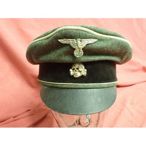 308 - WW2 German Waffen-SS infantry visor cap

Waffen-SS infantryman's visor cap by Erel. No moth nips to ... 