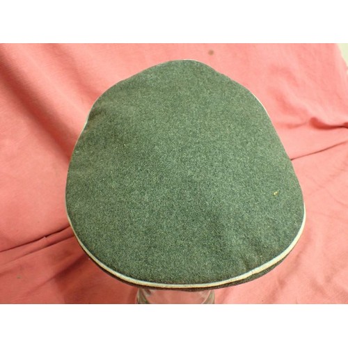 308 - WW2 German Waffen-SS infantry visor cap

Waffen-SS infantryman's visor cap by Erel. No moth nips to ... 