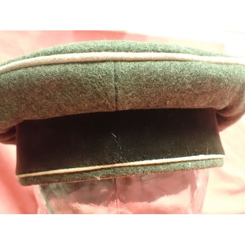 308 - WW2 German Waffen-SS infantry visor cap

Waffen-SS infantryman's visor cap by Erel. No moth nips to ... 