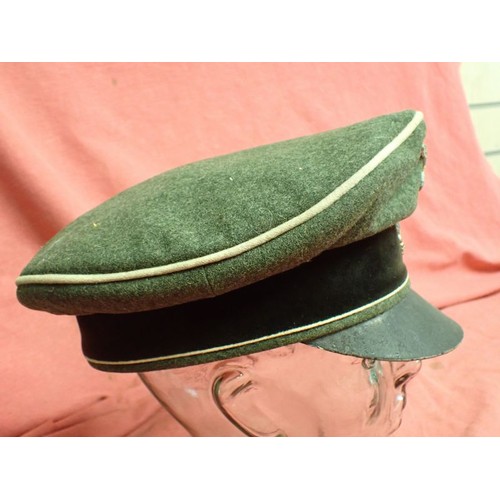 308 - WW2 German Waffen-SS infantry visor cap

Waffen-SS infantryman's visor cap by Erel. No moth nips to ... 