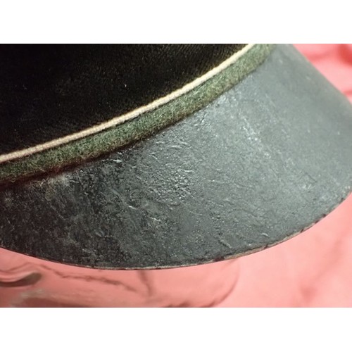 308 - WW2 German Waffen-SS infantry visor cap

Waffen-SS infantryman's visor cap by Erel. No moth nips to ... 