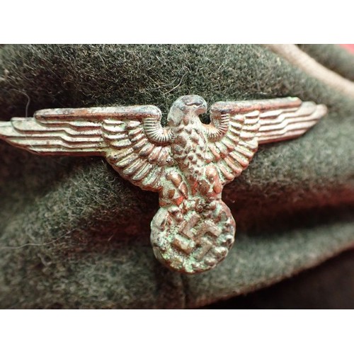 308 - WW2 German Waffen-SS infantry visor cap

Waffen-SS infantryman's visor cap by Erel. No moth nips to ... 