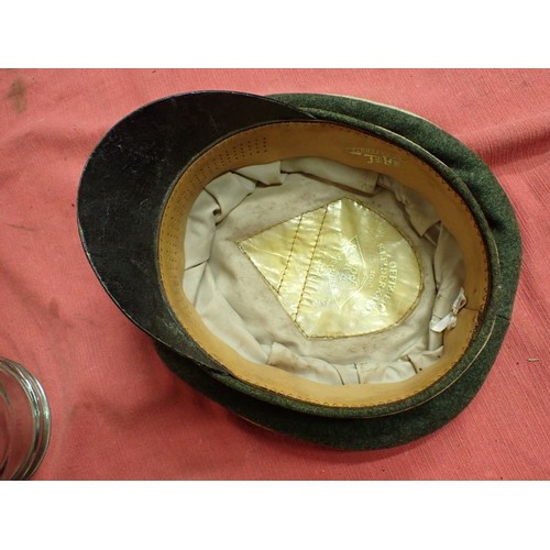 308 - WW2 German Waffen-SS infantry visor cap

Waffen-SS infantryman's visor cap by Erel. No moth nips to ... 