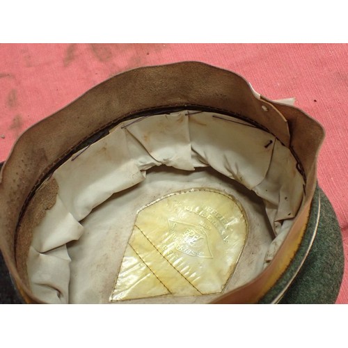 308 - WW2 German Waffen-SS infantry visor cap

Waffen-SS infantryman's visor cap by Erel. No moth nips to ... 