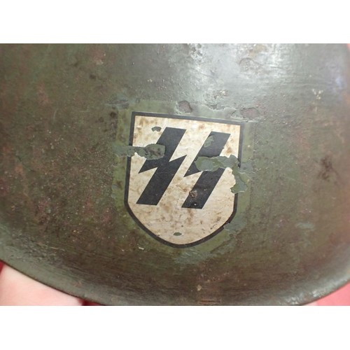 309 - WW2 Italian Waffen-SS volunteers steel helmet

Italian M33 steel helmet with a single Waffen-SS deca... 