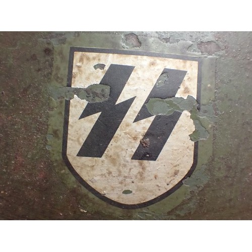 309 - WW2 Italian Waffen-SS volunteers steel helmet

Italian M33 steel helmet with a single Waffen-SS deca... 