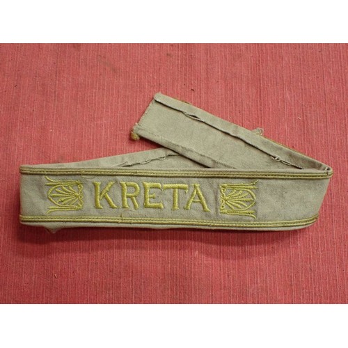 311 - WW2 German Army KRETA cuff title

Tunic removed KERTA cuff band. 458 mm long. Some mild staining and... 