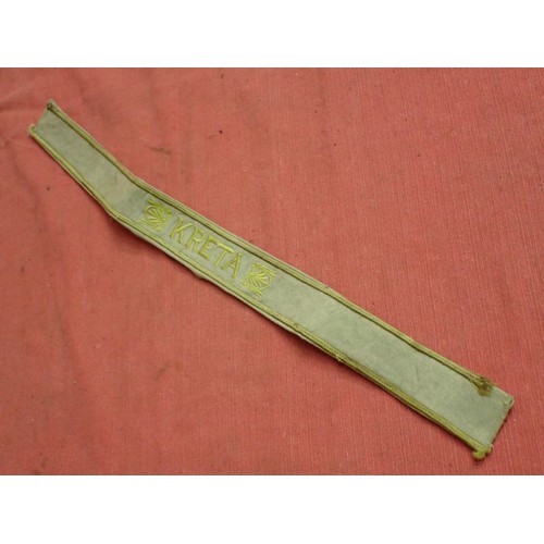 311 - WW2 German Army KRETA cuff title

Tunic removed KERTA cuff band. 458 mm long. Some mild staining and... 