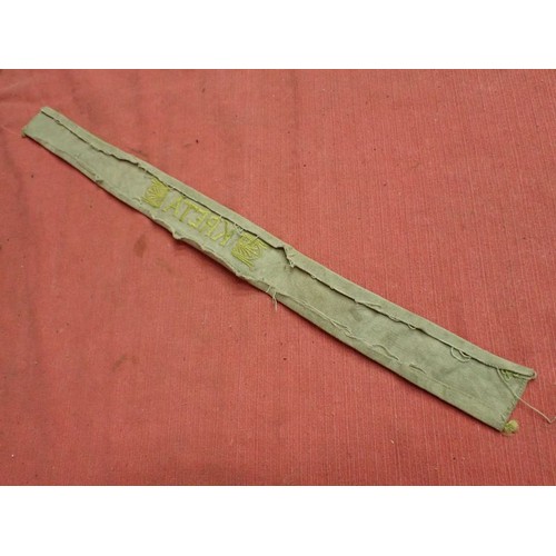 311 - WW2 German Army KRETA cuff title

Tunic removed KERTA cuff band. 458 mm long. Some mild staining and... 