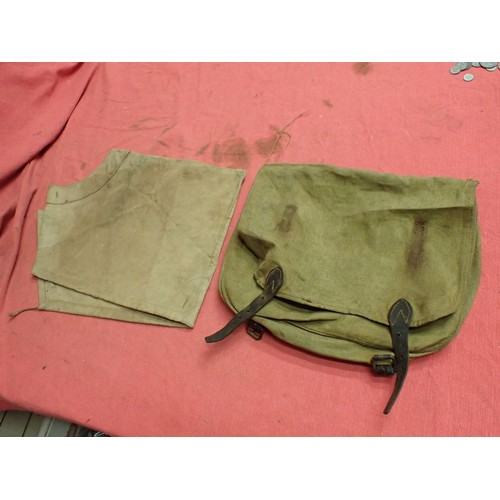 318 - WW2 German breech cover? and a canvas pack

What appears to be a breech cover, possibly for an anti-... 